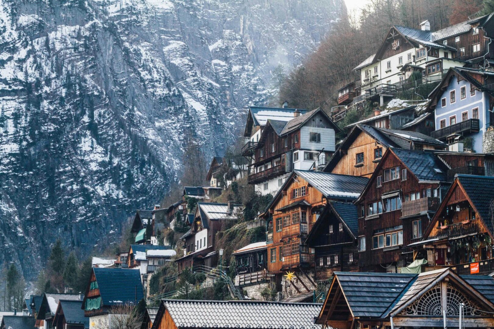 A mountain side with many houses on it