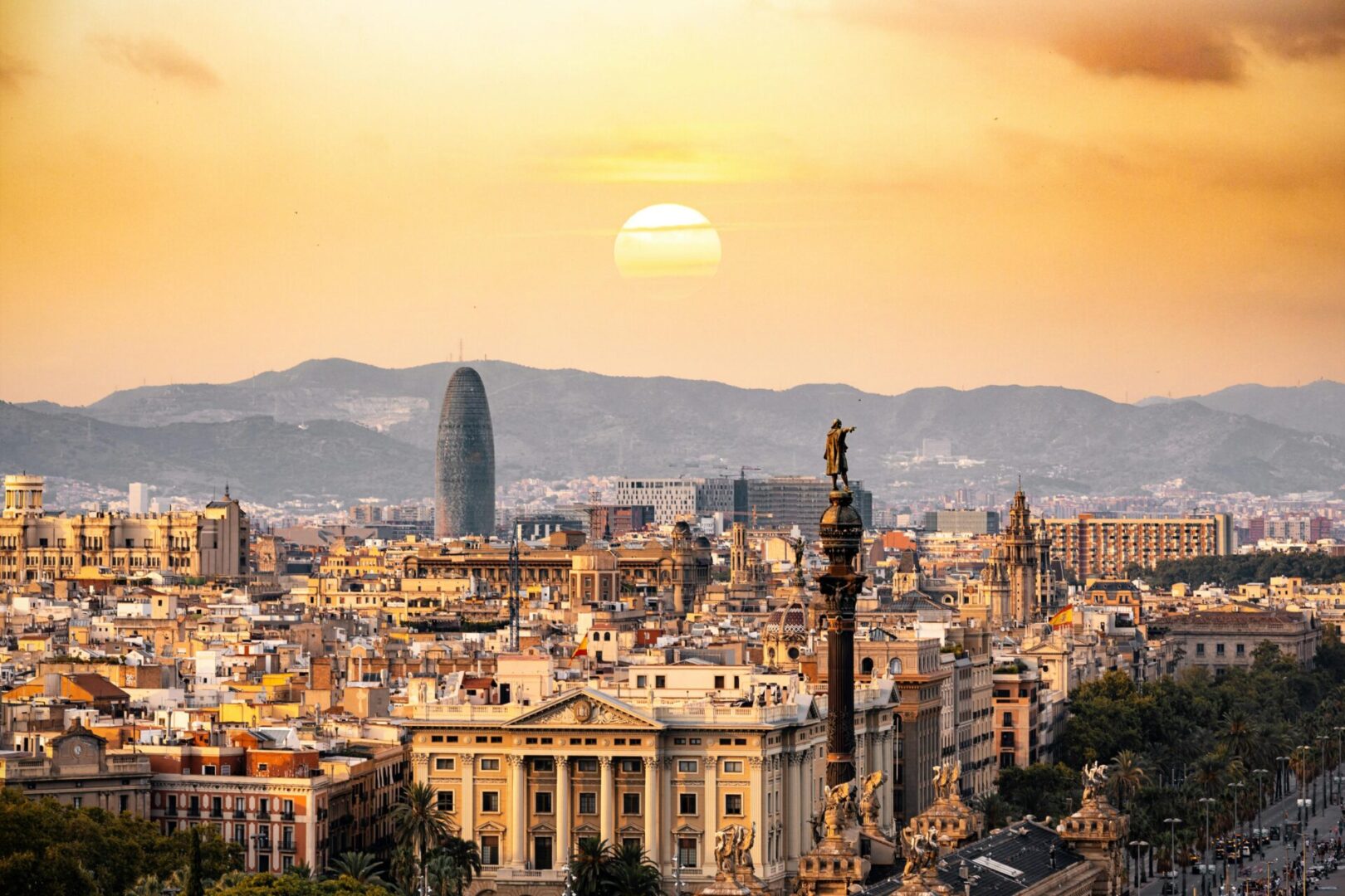 A view of the city skyline at sunset.